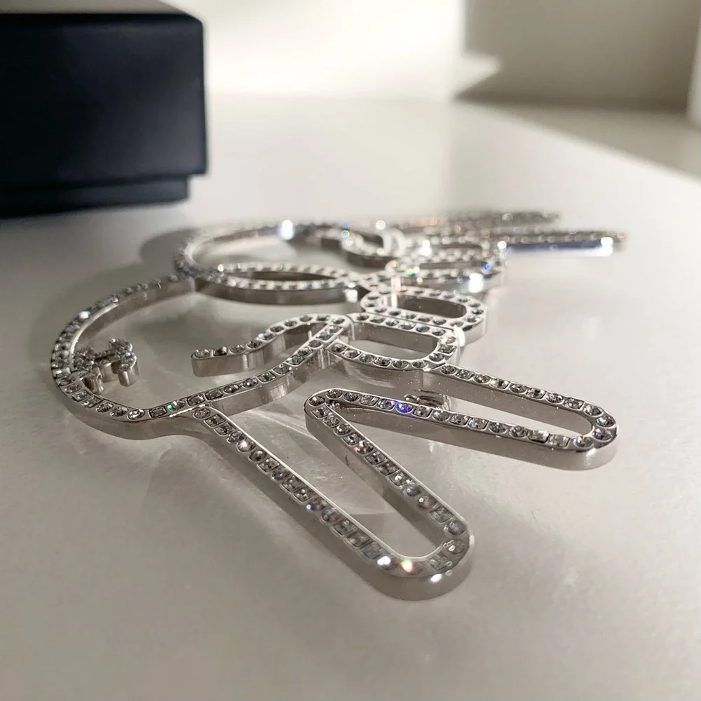Chanel large peace hands pin